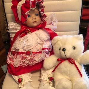 Red and White Baby Doll with Teddy Bear